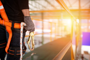 construction worker with carabiner for safety
